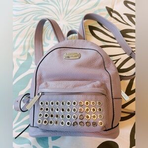 Michael Kors small purple backpack. Silver studded